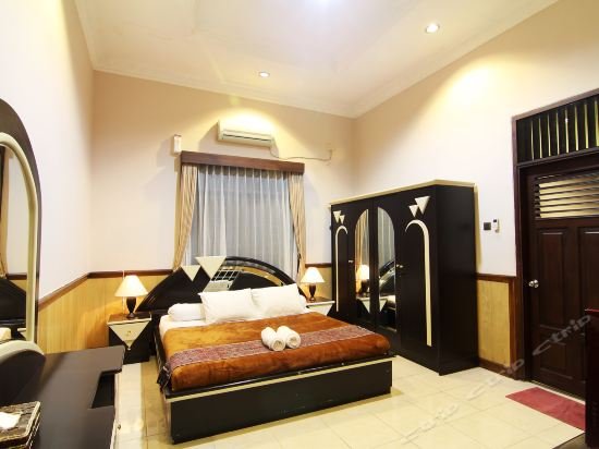 Фото Omah Lawas Homestay