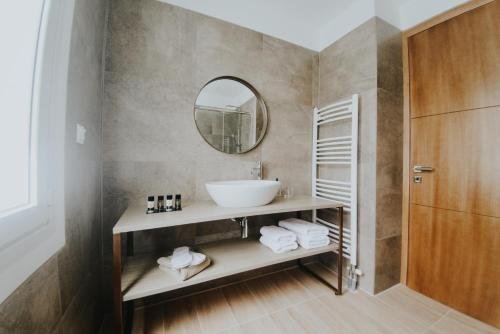 Фото Voulis Attico Rooms & Apartments