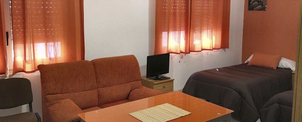 Фото Porta Nova Apartamentos