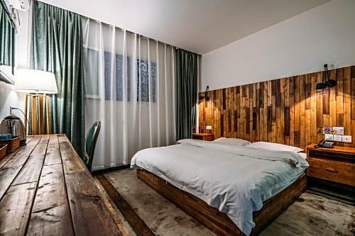 Фото Chengdu Sonderia Hostel&Bar-Lazybones