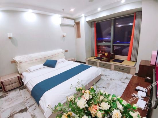 Фото Weihai You Gang Vacation ApartHotel