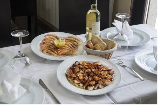 Фото Hotel Puerta de la Santa