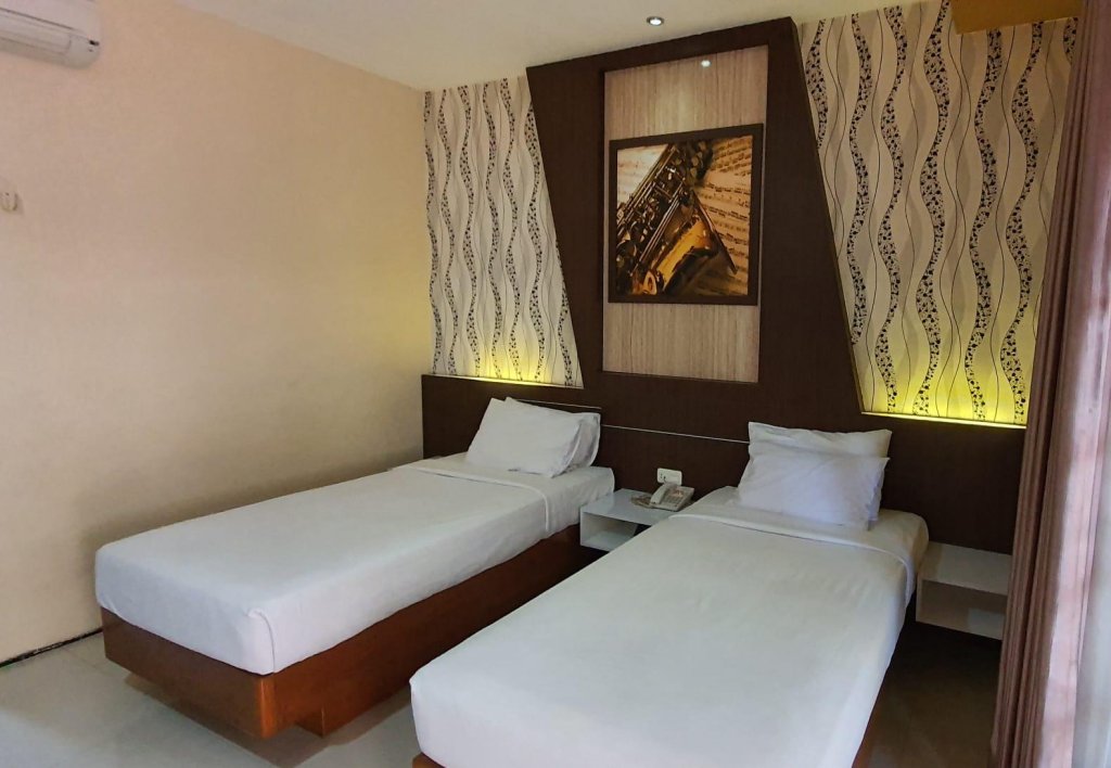 Фото Kartika Abadi Hotel