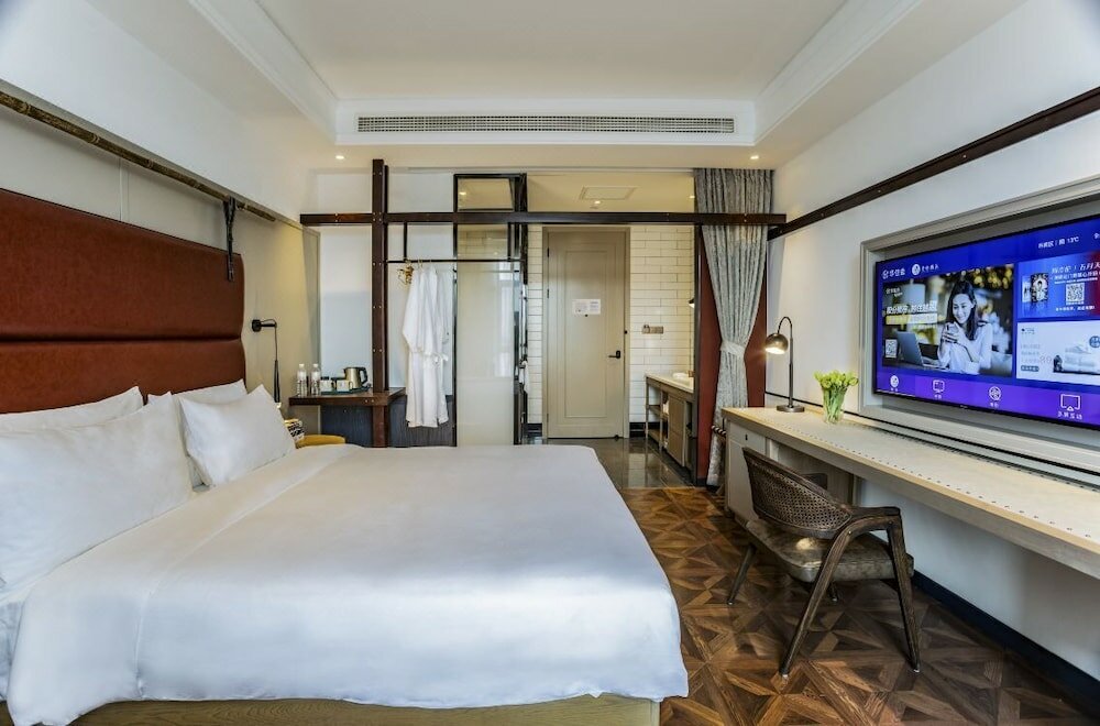 Фото Manxin Hotel Qingdao Zhanqiao