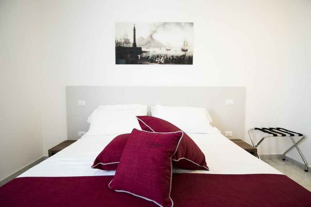 Фото Le Angioine Rooms