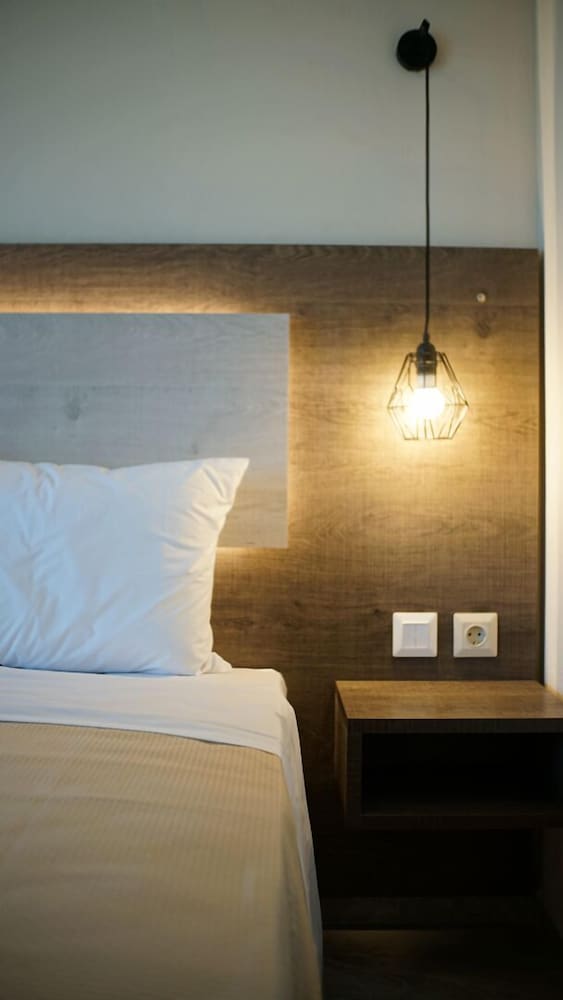 Фото Sinodinos Deluxe Apartments