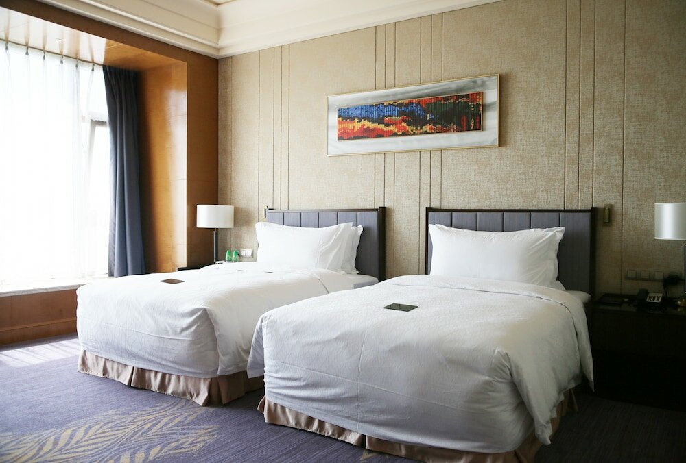 Фото Chateau Star River Qing Dao