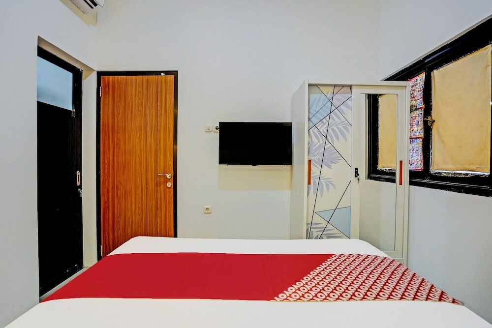 Фото OYO 92435 Sunlo Cozy Home Family Homestay Syariah