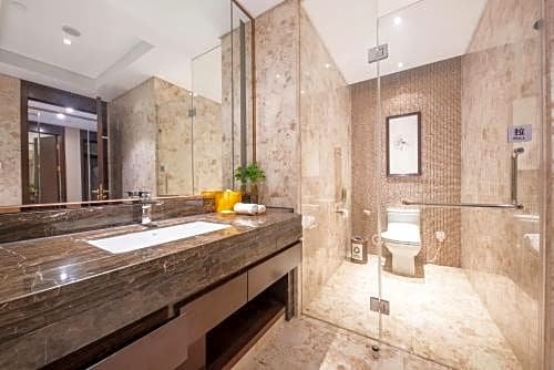 Фото Yiwu ShangCheng Hotel