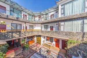 Гостиница Dali Mengyuanju Boutique Inn