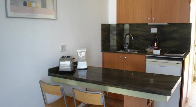 Фото Apartamentos Karina