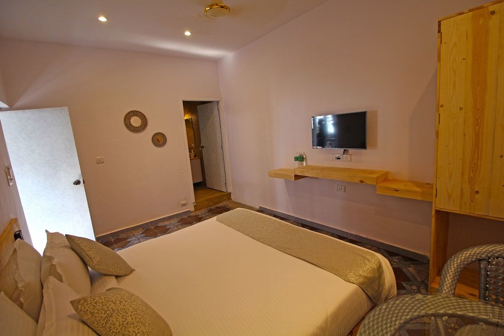 Фото Inn Morjim a Boutique Beach Hotel