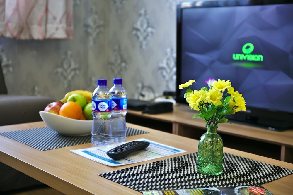 Фото Tanan Center Serviced Apartments