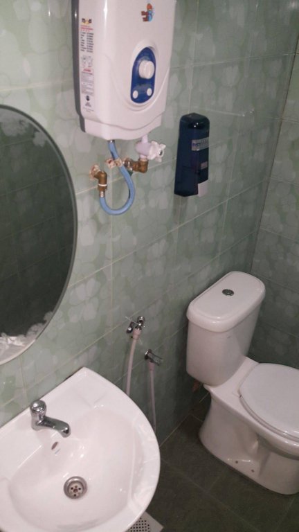 Фото Oyo 301 River Inn Hotel