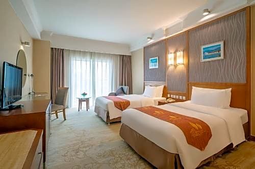 Фото Qingdao Blue Horizon Hotel Huangdao