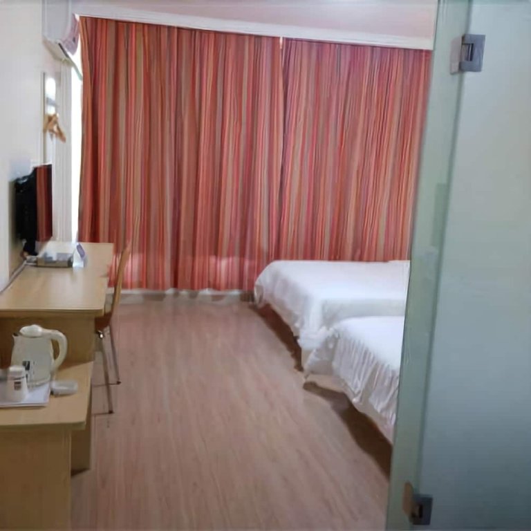 Фото 7 Days Inn Fangchenggang Taohuawan Plaza Branch