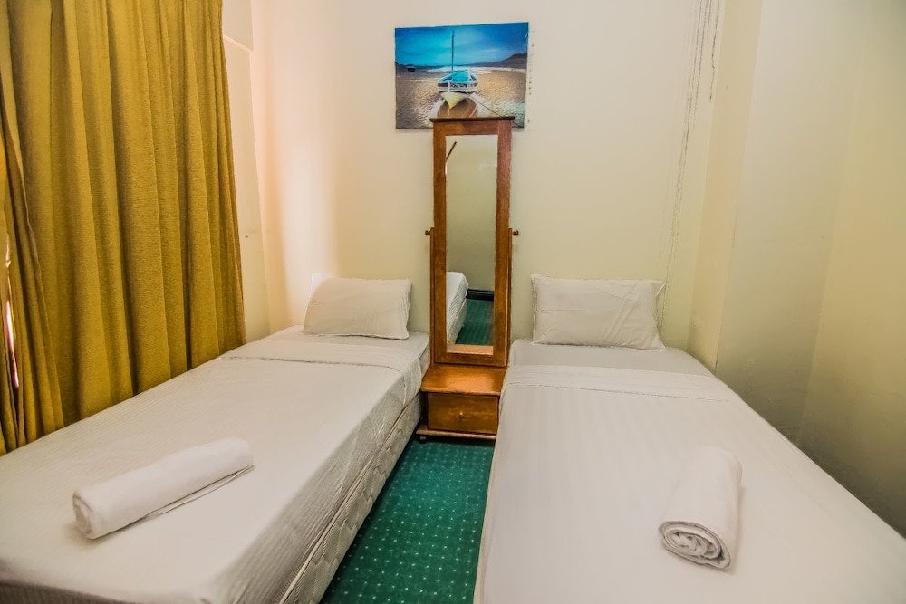 Фото Marina Travellers Suite Marina Court