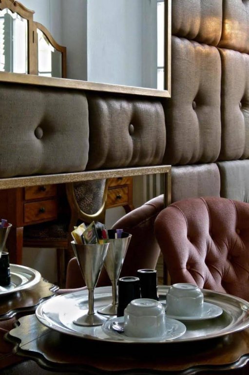 Фото Caffè dell'Arte Boutique Rooms