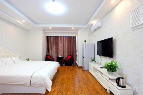 Фото Weihai You Gang Vacation ApartHotel