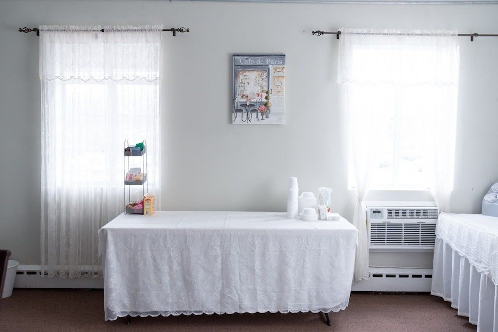 Фото Moon Inn Hotel