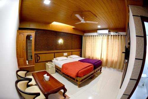 Фото Sharada International Hotel