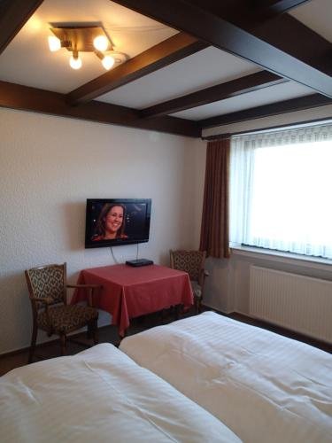 Фото Hotel-Garni Pfeffermuhle