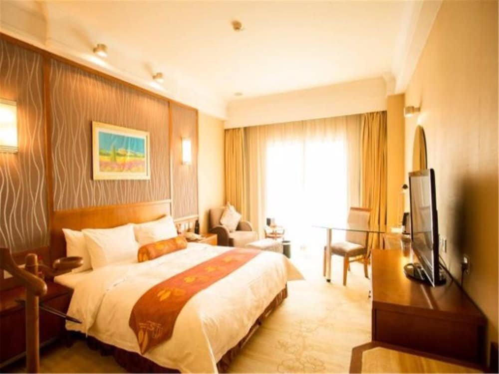 Фото Qingdao Blue Horizon Hotel Huangdao