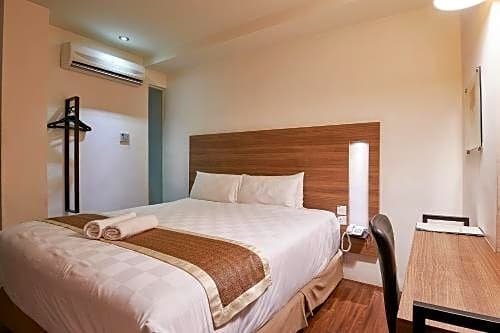 Фото The Leverage Business Hotel Mergong