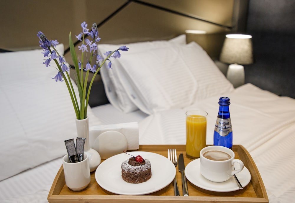 Фото Tapis Rouge Design Boutique Hotel 