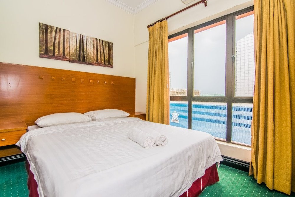 Фото Marina Travellers Suite Marina Court