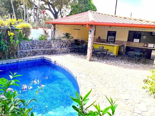 Гостиница Dos Palmas Studio Apartments в Алахуэла