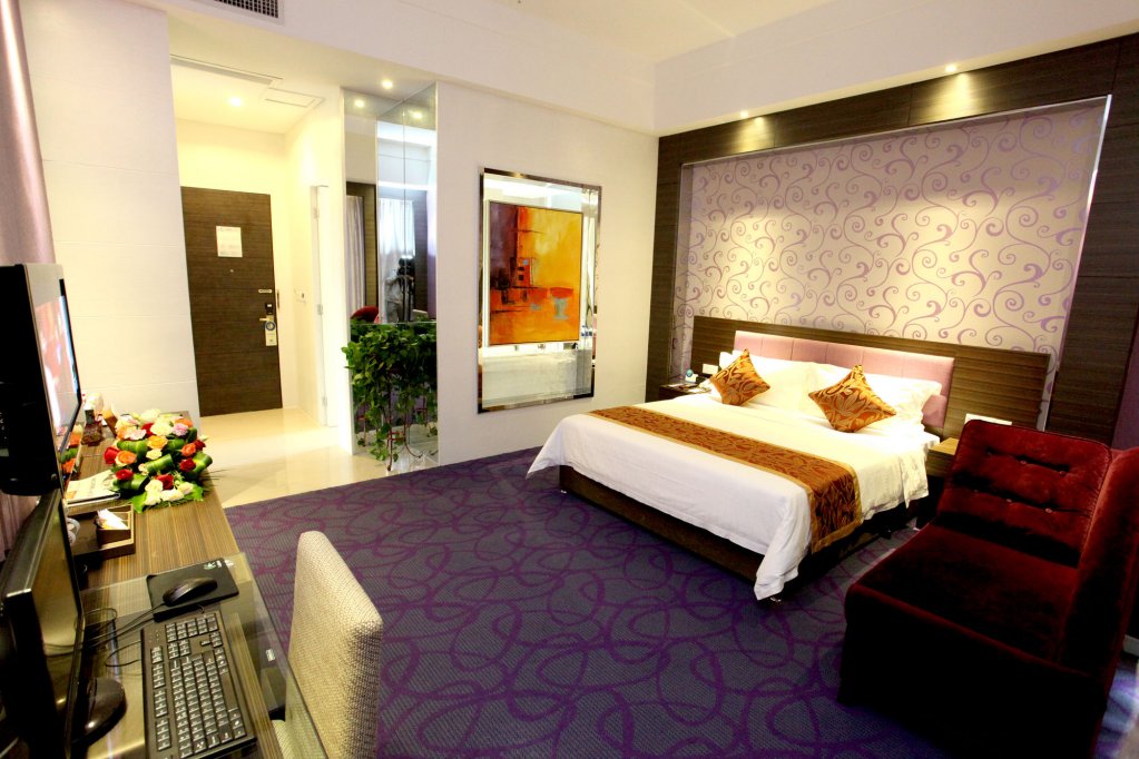 Фото New Beacon Jinyin Lake Intl Hotel