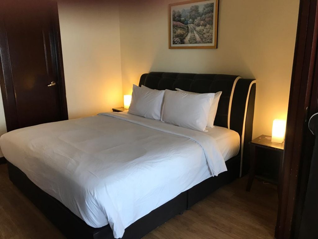 Фото Cool Service Suites at Times Square