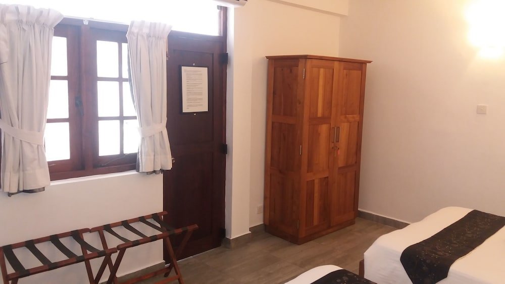 Фото Oyo 103 Lavinia Villa