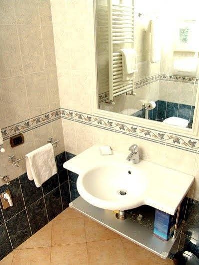 Фото Crosti Apartments