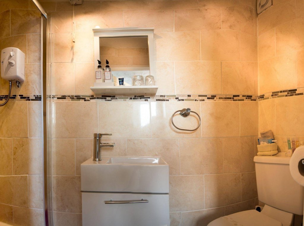 Фото The Glen Guest House