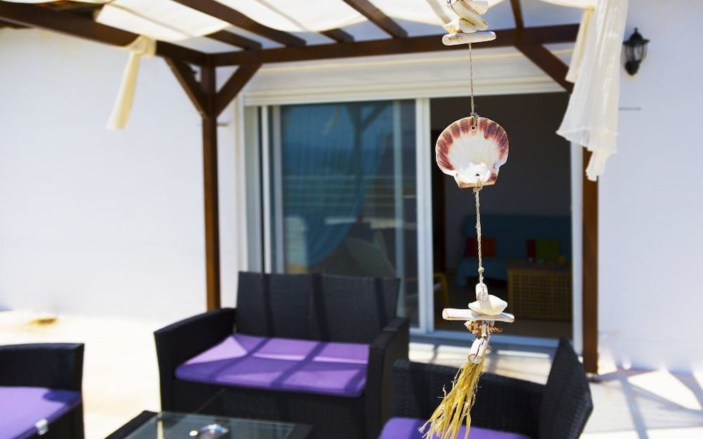 Фото Salonikiou Beach Deluxe Apartments