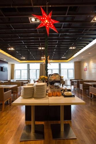 Фото Metropolo Wuhan Wanda Mansion