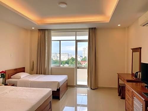 Фото Oyo 103 Airport Family Apartment