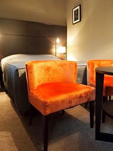 Фото Logis Hôtel Au Cerf d'Or