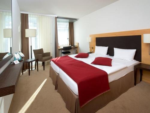 Фото Kongresshotel Potsdam am Templiner See