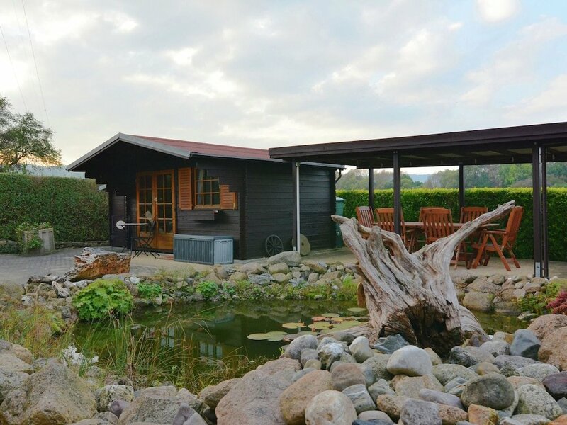 Гостиница Apartment in the Harz With a log Cabin, Pond and Covered Seating Area