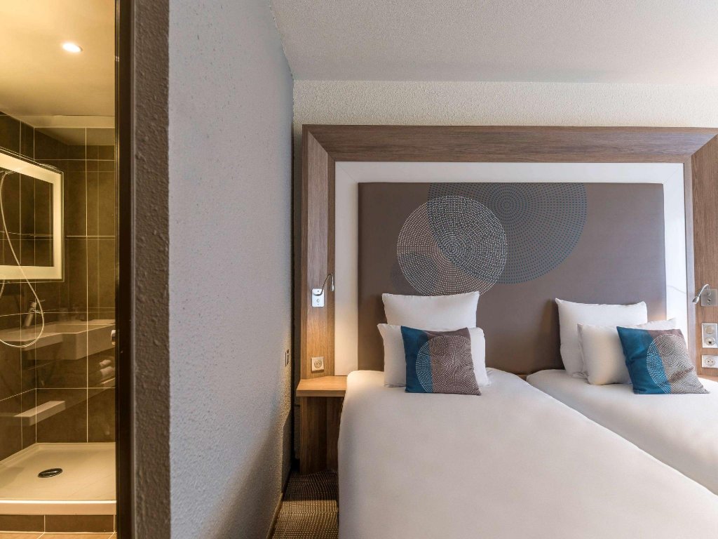 Фото Novotel Paris Saint Denis Stade Basilique