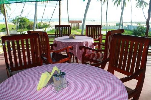 Фото M R Beach & Cottages