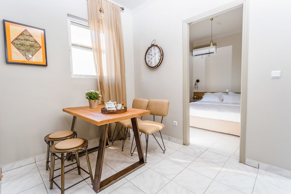 Фото Aris Athens Suites