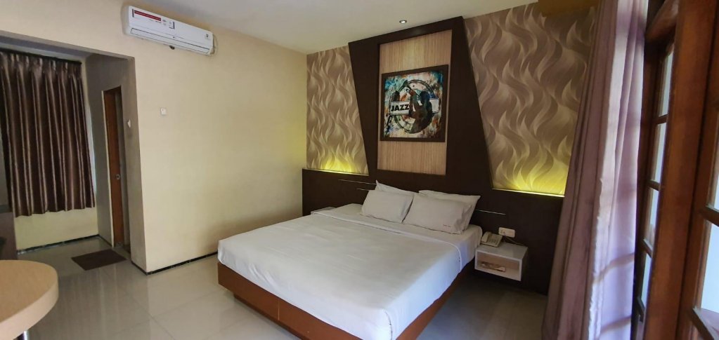 Фото Kartika Abadi Hotel