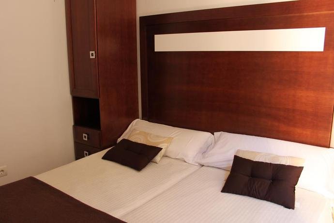 Фото Apartamentos Casa de la Lonja