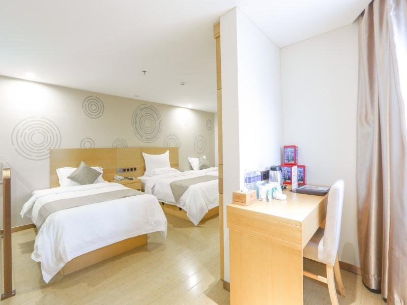 Фото GreenTree Inn Zhangjiagang Yangshe Old Street Stadium