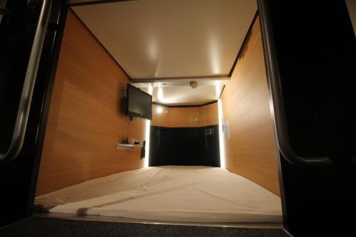 Фото Sejour Inn Capsule