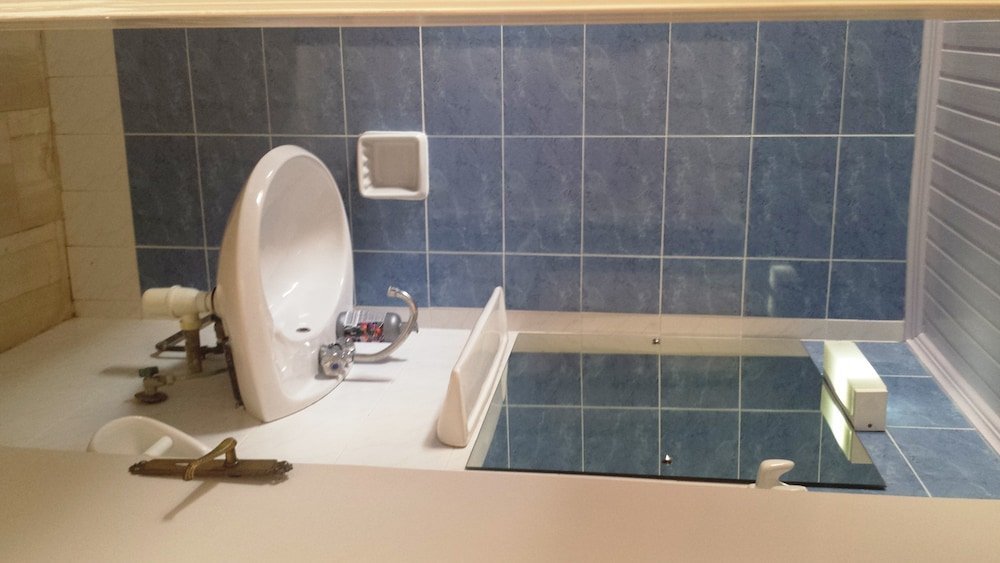 Фото Sunshine Inn Hotel